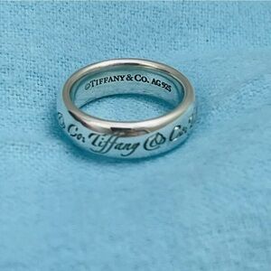 Tiffany and Co Inscripted band